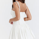 White pleated mini dress with corset bodice and thin straps — House of CB | Endless UAE