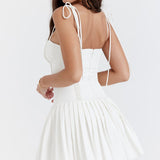 White pleated mini dress with corset bodice and thin straps — House of CB | Endless UAE