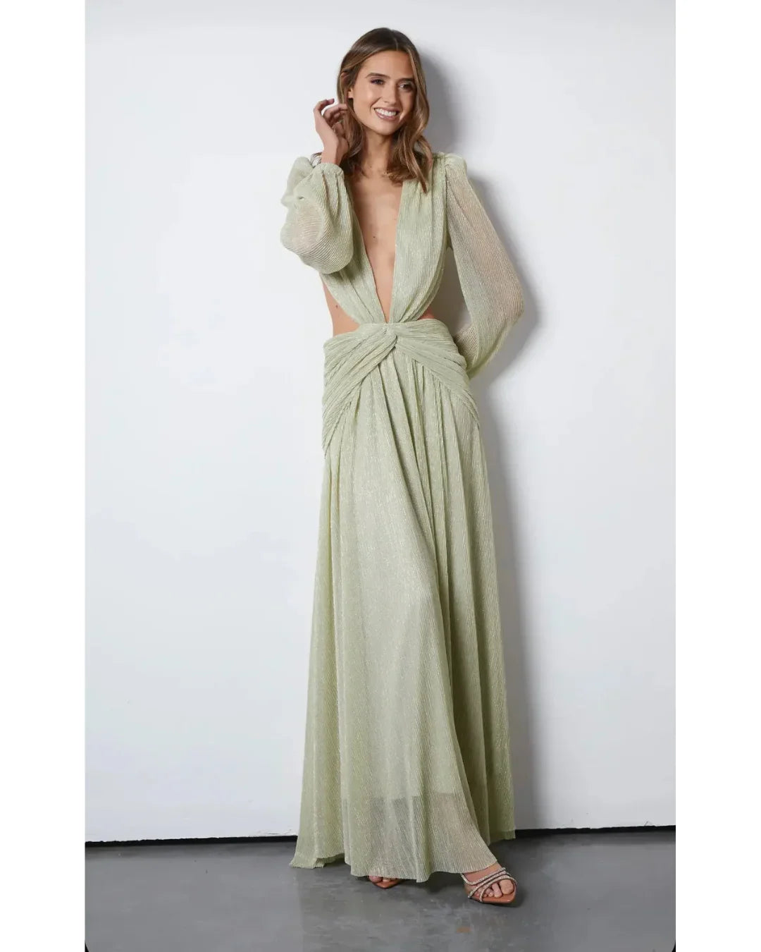 Woman wearing The Goddess Green Dress by Anne Louise Boutique — Endless UAE