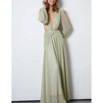 Woman wearing The Goddess Green Dress by Anne Louise Boutique — Endless UAE