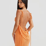 Woman wearing peach ribbed sleeveless maxi gown with cowl neckline — Melani The Label | Endless UAE