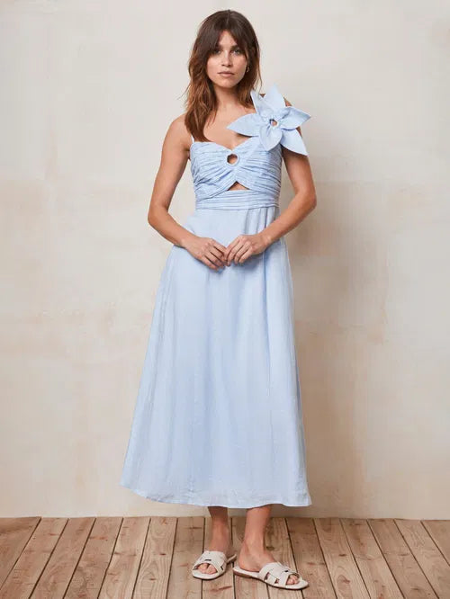 Woman wearing light blue linen midi dress with cut-out detail and bow shoulder — Mint Velvet | Endless UAE