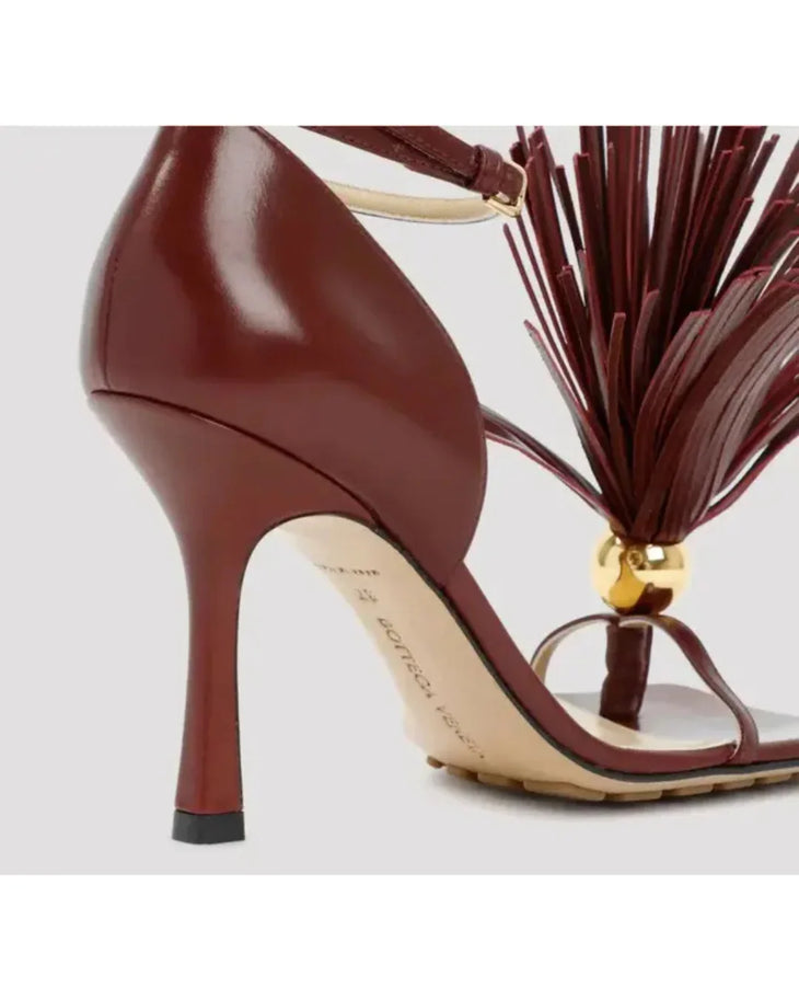 Burgundy leather sandal with tassel trim and ankle strap — Bottega Veneta | Endless UAE