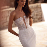 Strapless mermaid wedding dress with intricate beaded lace bodice and sheer illusion panel — You&I Bridal | Endless UAE