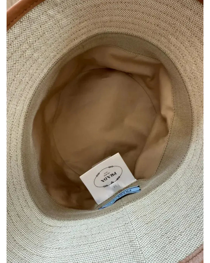 Cream linen blend bucket hat with tan leather trim and Prada logo — Prada | Endless UAE