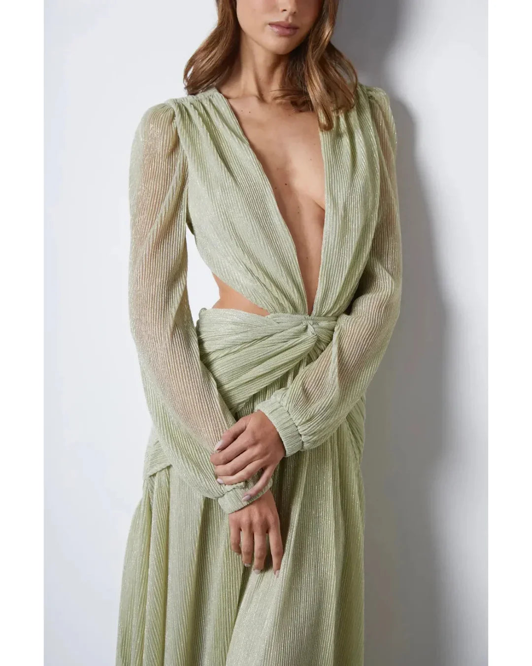 Woman wearing The Goddess Green Dress by Anne Louise Boutique — Endless UAE