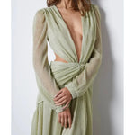 Woman wearing The Goddess Green Dress by Anne Louise Boutique — Endless UAE