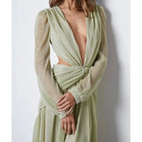 Woman wearing The Goddess Green Dress by Anne Louise Boutique — Endless UAE