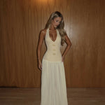 Elegant white halter maxi dress with plunging neckline and gold star details — Vivienne Collection | Endless UAE