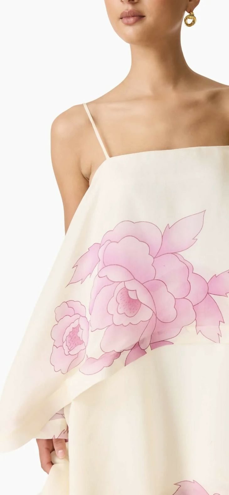 Rova Tiered Dress in cream with pink floral print, featuring layered ruffles and adjustable straps — Endless | Endless UAE