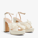 Cream platform heels with pleated bow detail and ankle strap — Loeffler Randall | Endless UAE