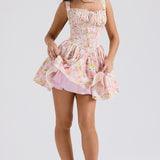Pink floral print mini dress with gathered bodice, corset waist, and full skirt with tulle underlay — House of CB | Endless UAE