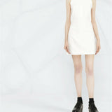 White sleeveless mini dress with square neckline and cut-out back detail, styled with platform boots — Courrèges | Endless UAE