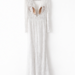 Elegant white lace wedding dress with long sleeves and flowing tulle train — Tatiana Kaplun | Endless UAE