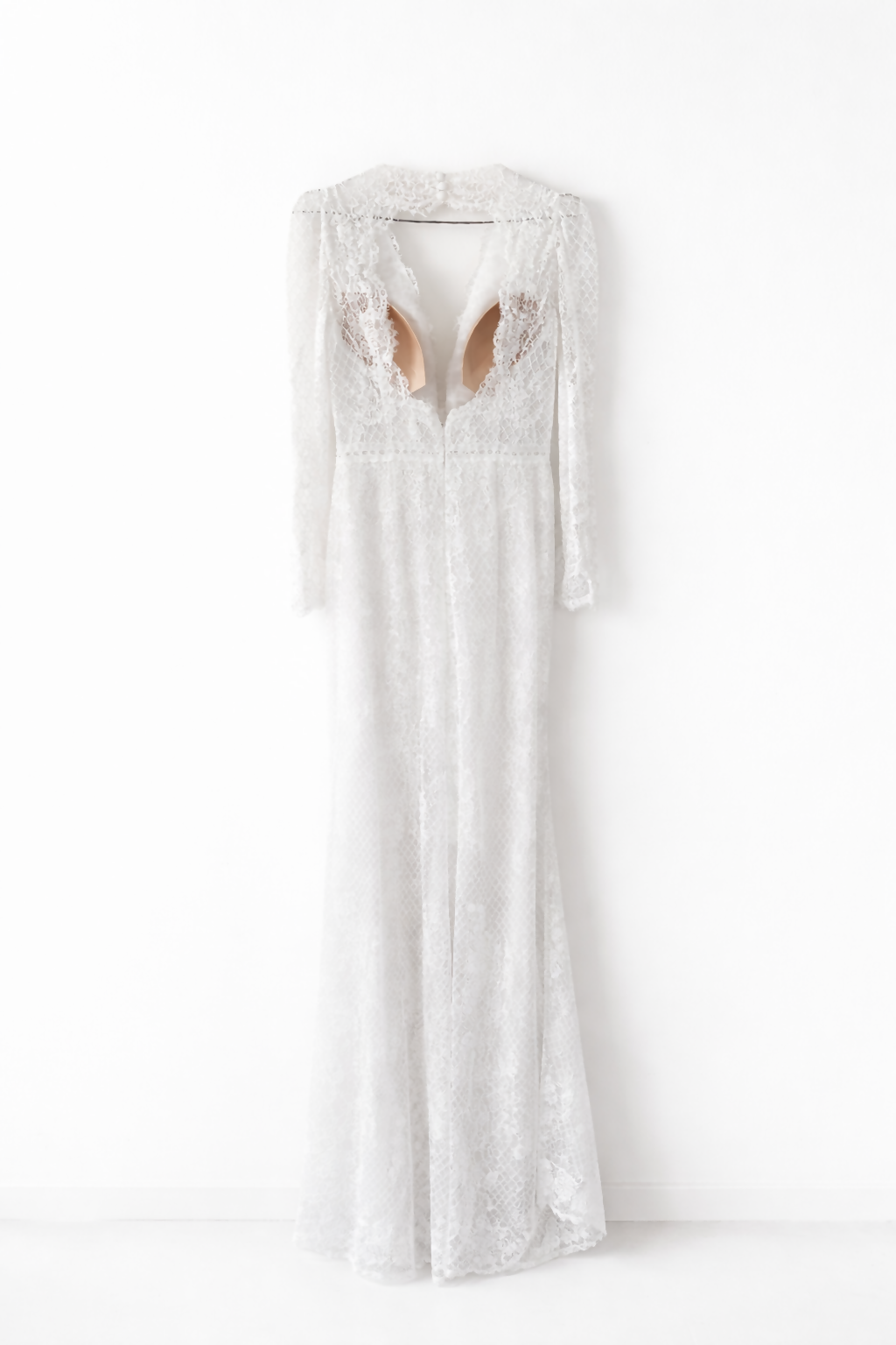 Elegant white lace wedding dress with long sleeves and flowing tulle train — Tatiana Kaplun | Endless UAE