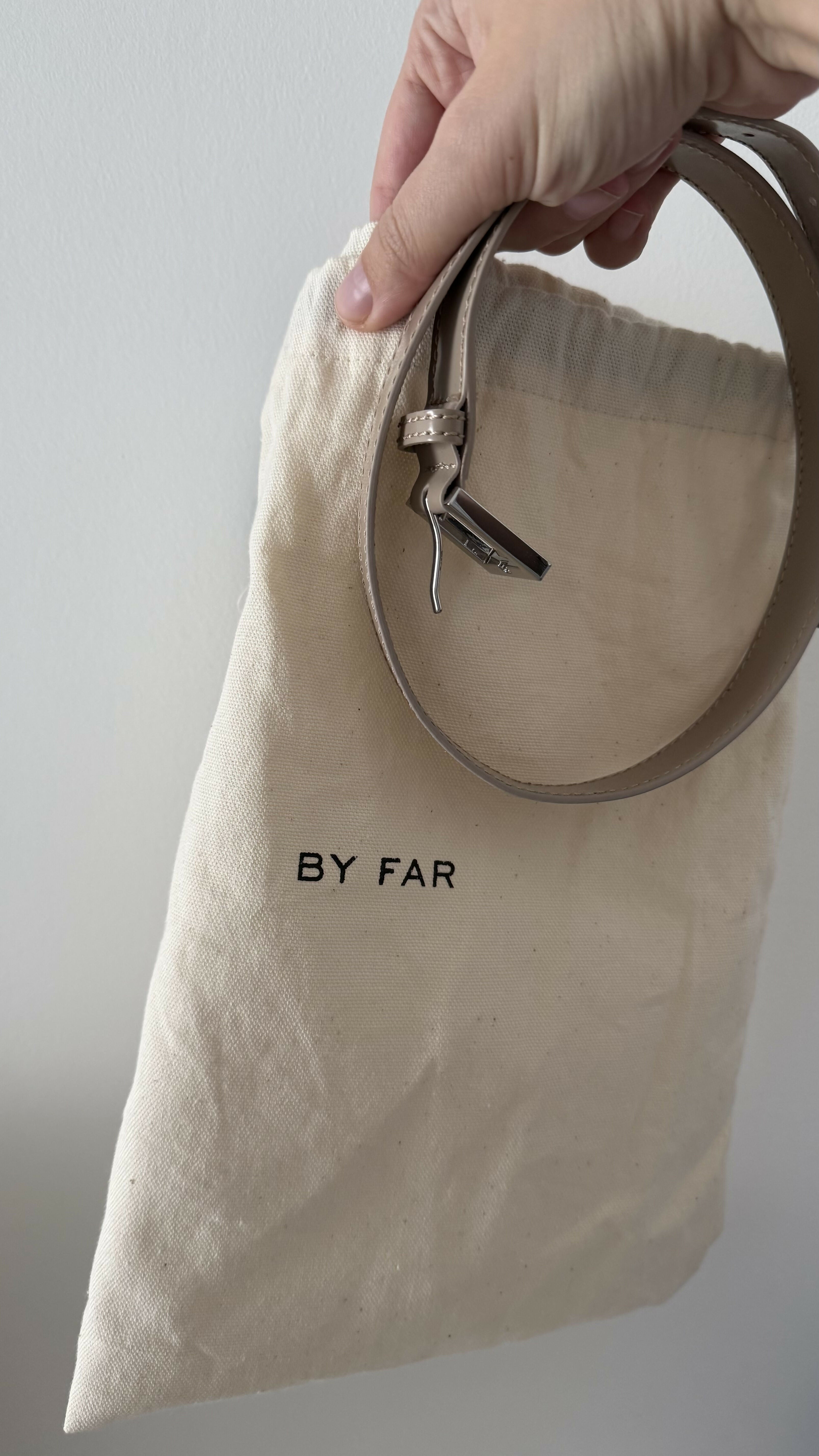 Beige patent leather shoulder bag with dual compartments and silver turnlock closures — Endless | Endless UAE