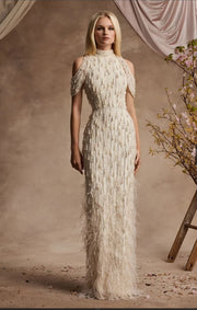 Ivory floor-length gown with beaded embellishments, draped sleeves, and feather trim hem — Pamella Roland | Endless UAE
