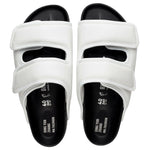 White leather double-strap sandals with black footbed and cushioned upper straps by Dingyun Zhang — 1774 Birkenstock | Endless UAE