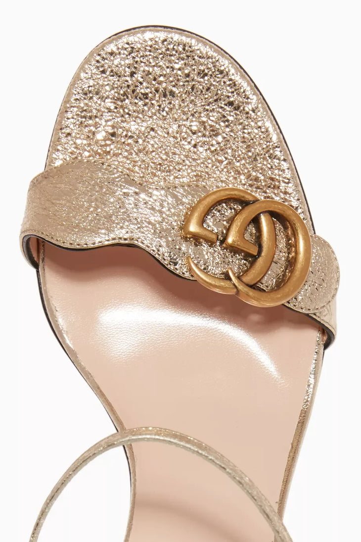 Metallic gold Marmont laminate leather sandals with block heel and GG buckle — Gucci | Endless UAE