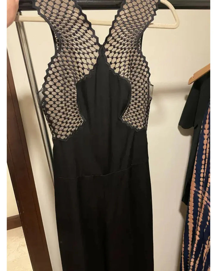 Black sleeveless catsuit with mesh panel details and wide-leg silhouette — Stella McCartney | Endless UAE
