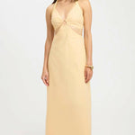Yellow halter neck maxi dress with cutout ring detail at bust and mesh panel, styled with gold bracelet — Kookai | Endless UAE