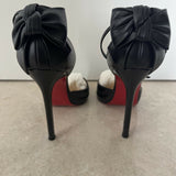 Black leather peep-toe platform pumps with bow detail and lace-up ankle straps — Christian Louboutin | Endless UAE