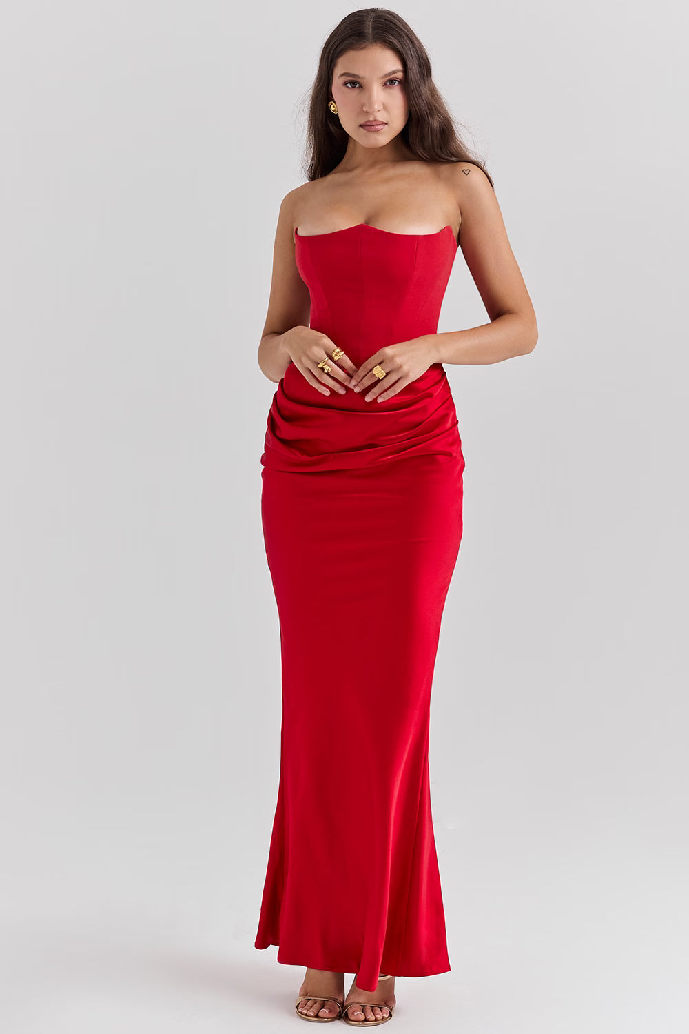 Model wearing Persephone Scarlet strapless corset maxi dress in red with ruched waist detail — House of CB | Endless UAE