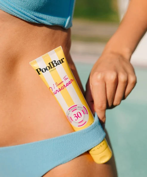 PoolBar London SPF 30 mineral sunscreen tube with yellow and white striped packaging — Powder Beauty | Endless UAE