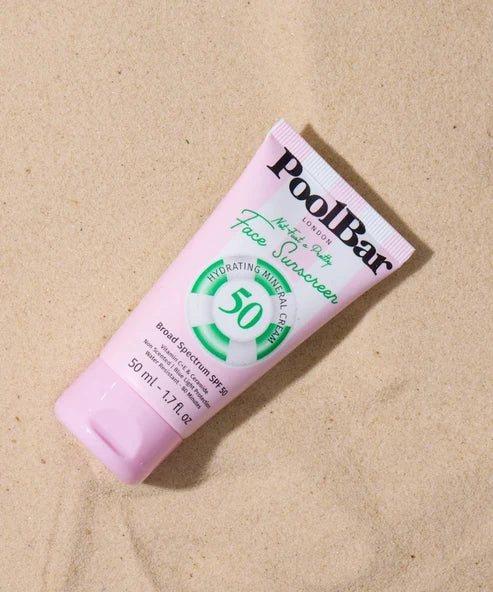 PoolBar London Face Sunscreen SPF 50 pink tube with green mineral circle logo — Powder Beauty | Endless UAE