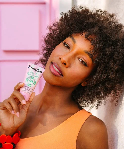 PoolBar London Face Sunscreen SPF 50 pink tube with green mineral circle logo — Powder Beauty | Endless UAE
