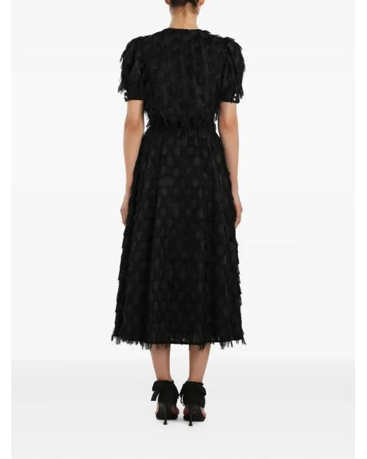 Black fringe-detailed midi dress with puff sleeves, shown from back view on model — Post Meridiem | Endless UAE