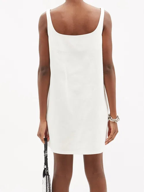 White cotton-drill sleeveless mini dress with square neckline and triangle-embossed detailing — Prada | Endless UAE