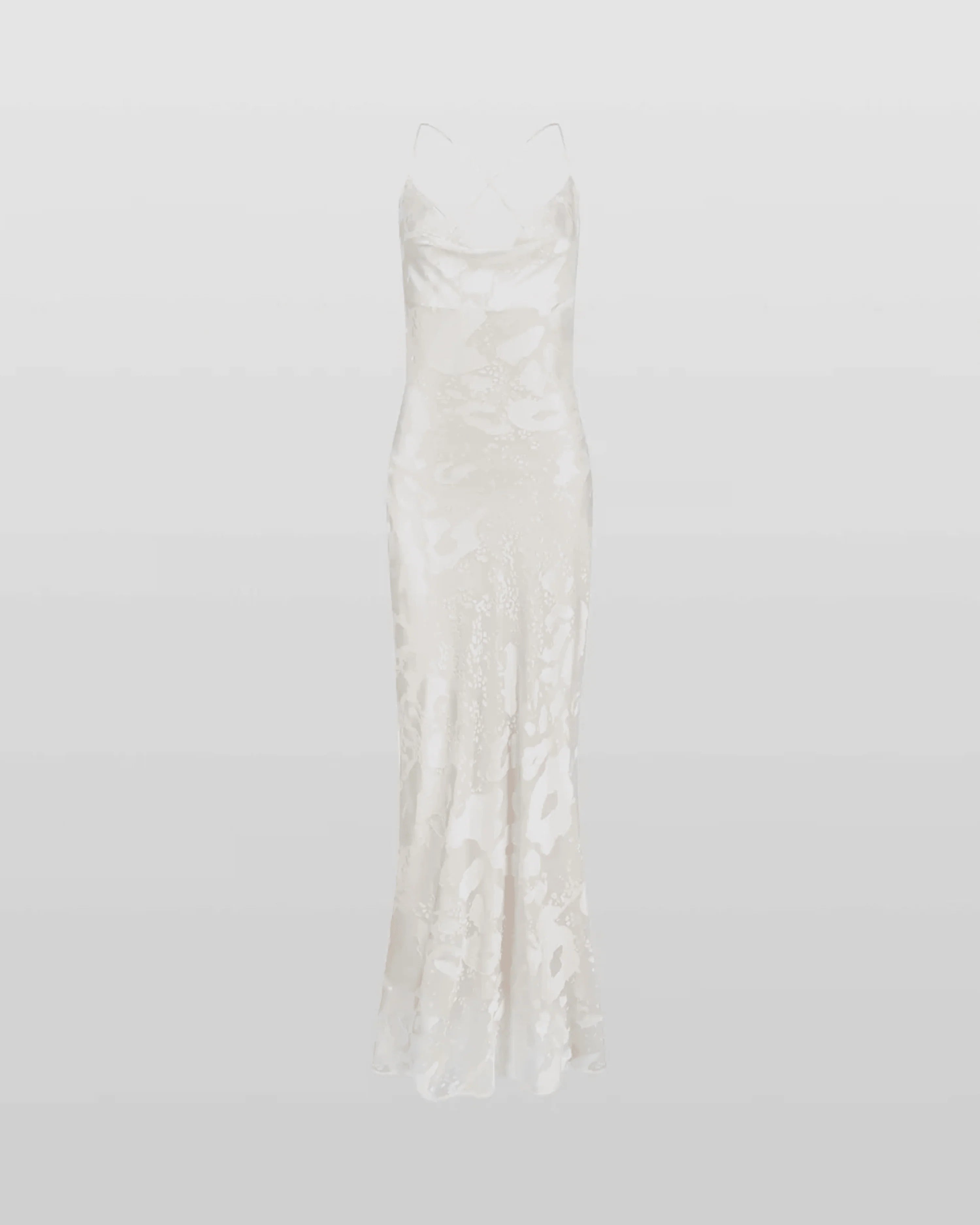 Woman wearing white Primrose Dress against weathered stone wall — Rat & Boa | Endless UAE