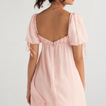 Princess Pink Quartz mini dress with puff sleeves and low back, worn by model — House of CB | Endless UAE