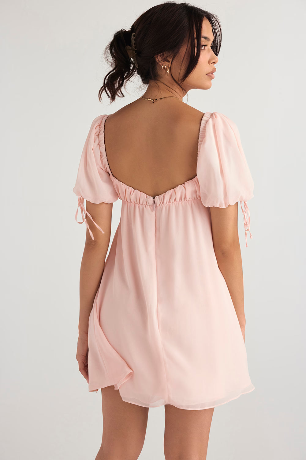 Princess Pink Quartz mini dress with puff sleeves and low back, worn by model — House of CB | Endless UAE