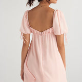 Princess Pink Quartz mini dress with puff sleeves and low back, worn by model — House of CB | Endless UAE