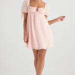 Soft pink babydoll mini dress with puff sleeves, square neckline and empire waist styling — House of CB | Endless UAE