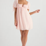 Soft pink babydoll mini dress with puff sleeves, square neckline and empire waist styling — House of CB | Endless UAE