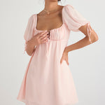 Soft pink mini dress with puff sleeves, square neckline with lace-up detail and gathered empire waist — House of CB | Endless UAE