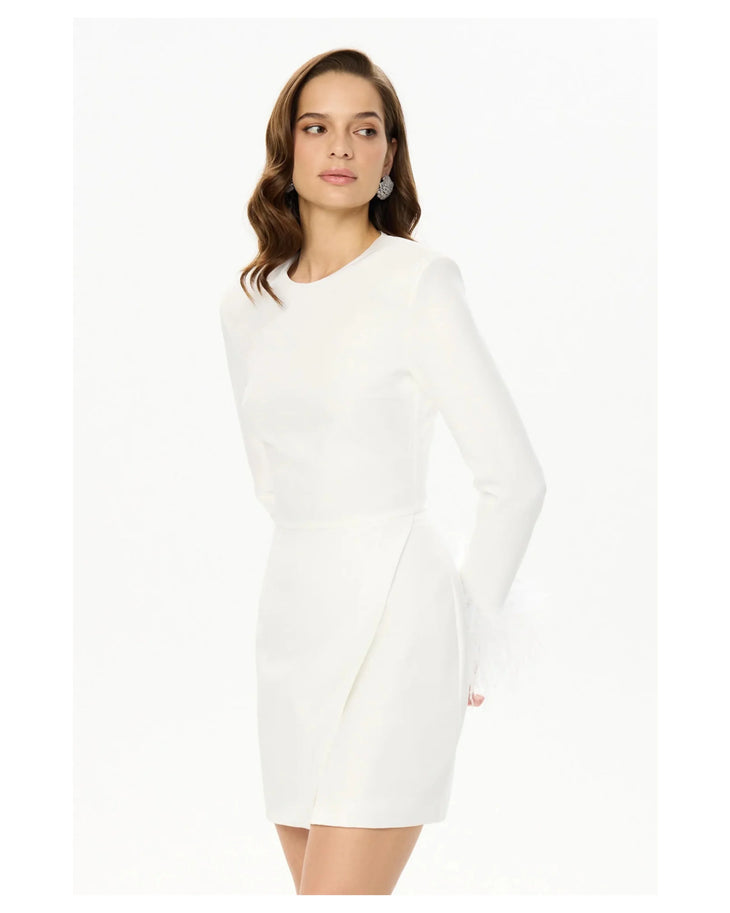 White feather sleeve mini dress in luxurious setting — Post Meridiem | Endless UAE