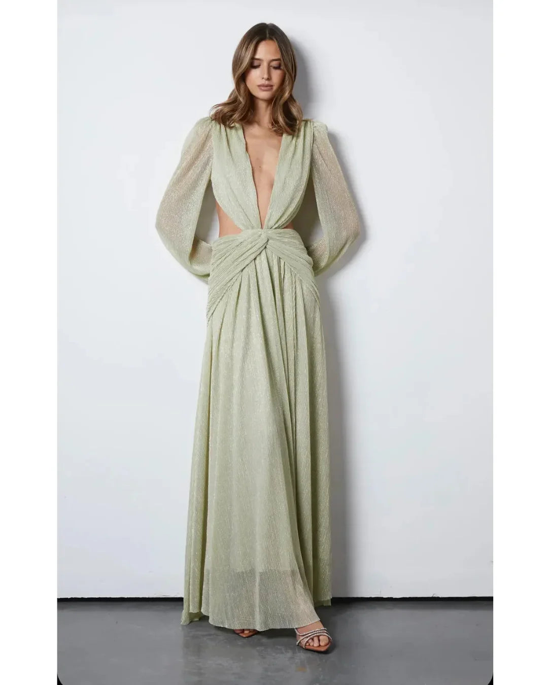 Woman wearing The Goddess Green Dress by Anne Louise Boutique — Endless UAE