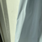 Woman wearing light blue sleeveless midi dress with corset top and full skirt — Endless | Endless UAE