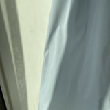 Woman wearing light blue sleeveless midi dress with corset top and full skirt — Endless | Endless UAE