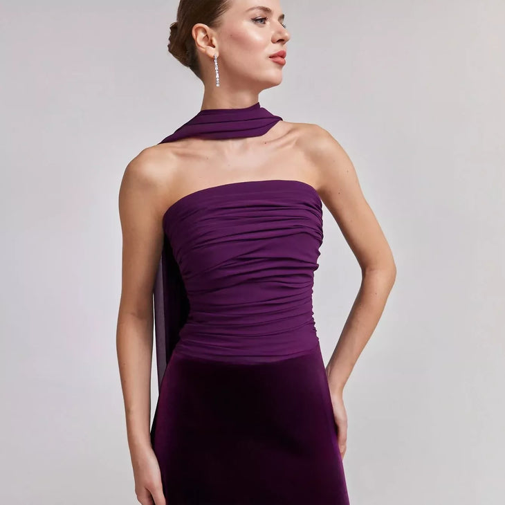 Woman wearing purple velvet strapless gown with draped chiffon scarf — Aleena | Endless UAE