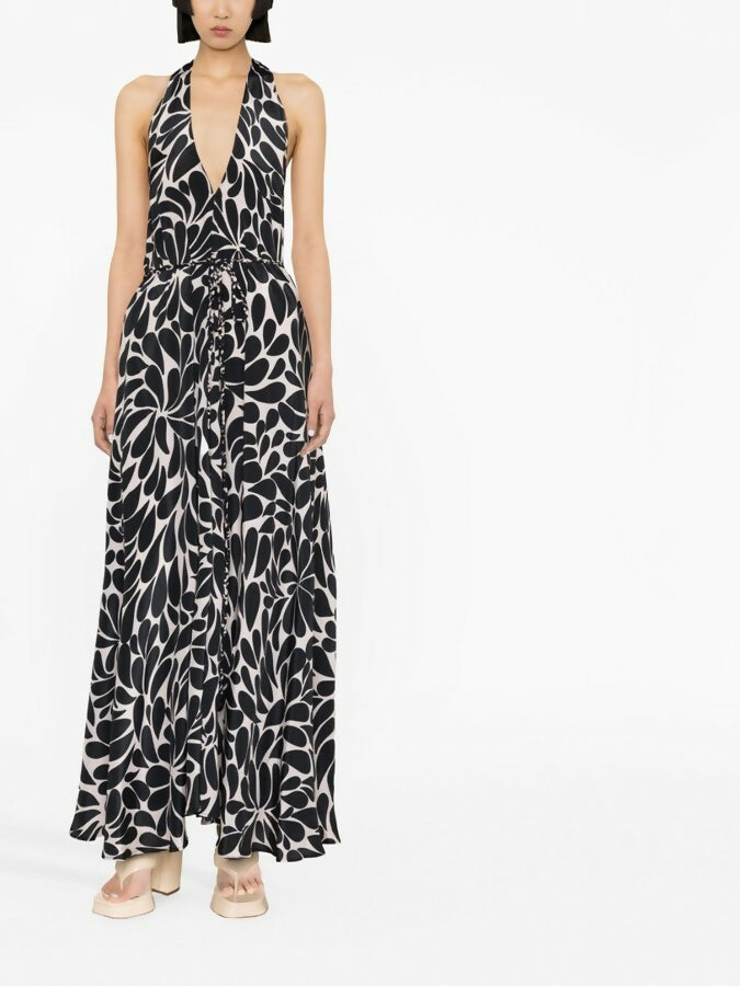 Black and white floral halter jumpsuit with deep V-neckline and wide-leg silhouette — Alexandra Miro | Endless UAE