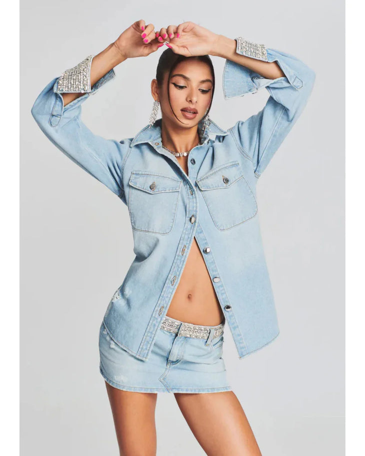 Light blue denim shirt dress with crystal-embellished cuffs and distressed details — Retrofete | Endless UAE