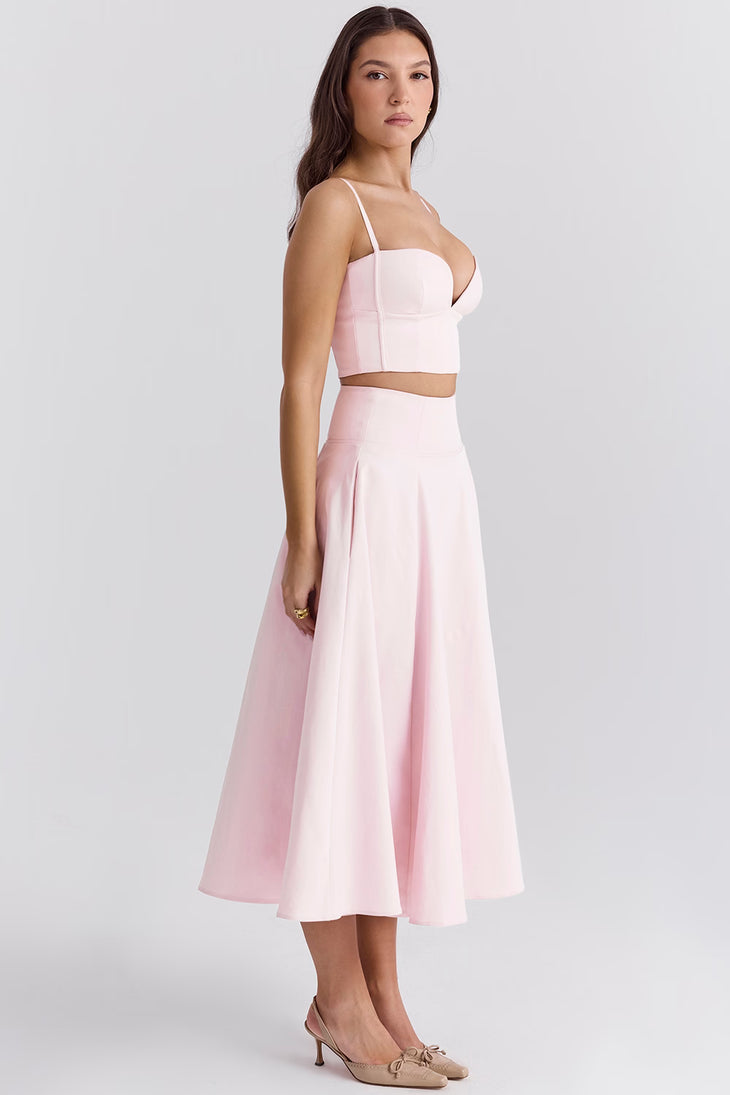 Soft pink two-piece crop top and midi skirt co-ord set with corset bodice and flared skirt — House of CB | Endless UAE