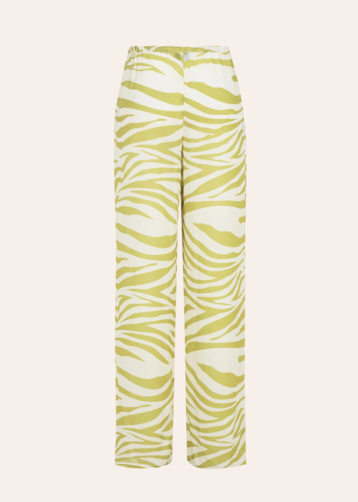 Zebra print trousers in cream and tan worn with matching blazer — Dvete | Endless UAE