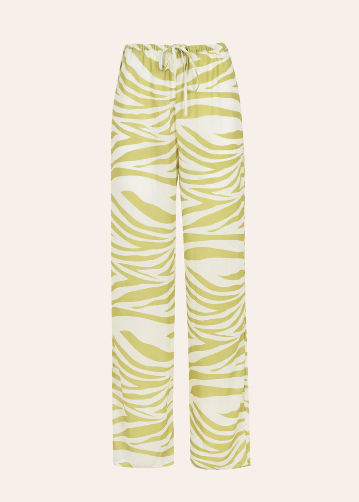 Zebra print trousers in cream and tan worn with matching blazer — Dvete | Endless UAE