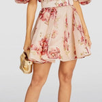 Floral print mini dress with puff sleeves, V-neck, and matching belt in pink tones — ZIMMERMANN | Endless UAE
